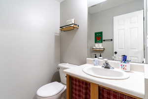 Bathroom featuring toilet and vanity