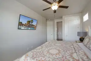 Bedroom featuring a ceiling fan
