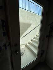 Separate basement entrance behind RV garage