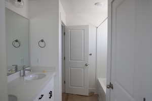 Bathroom with double vanity and a sink