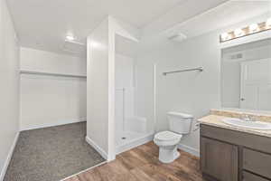 Bathroom with vanity,  walk in shower, toilet