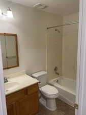 Hallway bathroom with tub/shower combo.