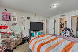 Bedroom with carpet flooring