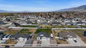 Aerial view featuring a mountain view and a residential view