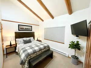 Bedroom with a baseboard heating unit