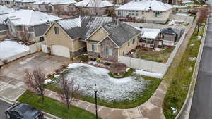 Snowy aerial view with a residential view