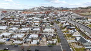 Drone / aerial view featuring a residential view and a mountain view