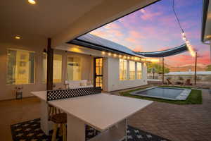 Exterior space with an outdoor pool