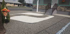 View of yard featuring fence