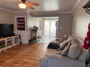 Living room freshly painted with crown molding