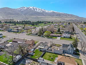Drone / aerial view with a residential view and a mountain view