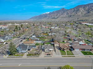 Birds eye view of property featuring a residential view and a mountain view
