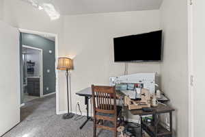Office featuring baseboards and carpet floors