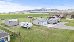 Drone / aerial view with a rural view and a mountain view