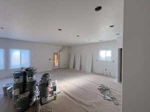 Unfurnished living room with a textured ceiling