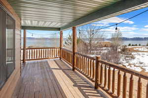 Deck featuring a water view