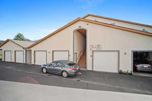 Exterior space featuring garages