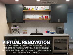 Virtual Renovation--This image shows how you could finish this space by adding cabinets, sink, appliances and countertops.  Currently this space is empty.