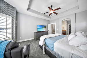 This main floor primary retreats offers a tray ceiling, bay window plus an attached spa style bath and walk-in closet.
