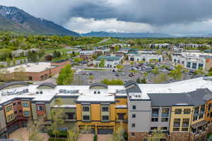 Birds eye view of property with a mountain view and a residential view