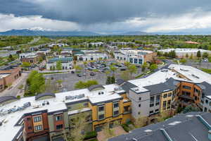 Aerial view featuring a mountain view and a residential view
