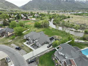 Drone / aerial view with a residential view and a mountain view