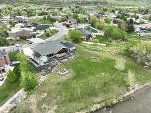 Aerial view with a residential view and a water view