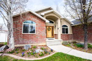 Property entrance with brick siding