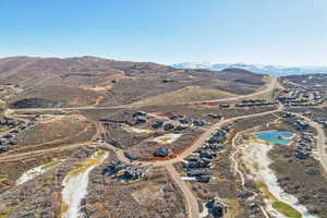 Birds eye view of property with a mountain view