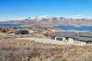 Mountain view featuring a water view