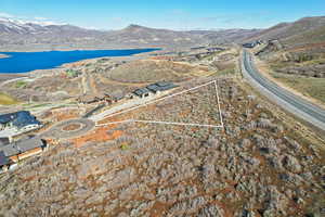 Bird's eye view with a water and mountain view