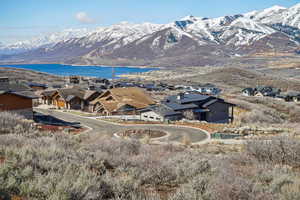 View of mountain feature with a water view and a residential view