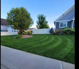 View of yard featuring fence