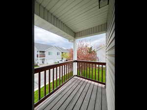 Wooden deck featuring a residential view