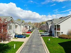 View of road featuring curbs and a residential view