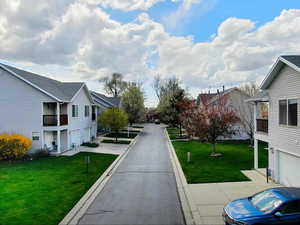 View of road with curbs and a residential view