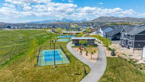 Drone / aerial view featuring a mountain view and a residential view