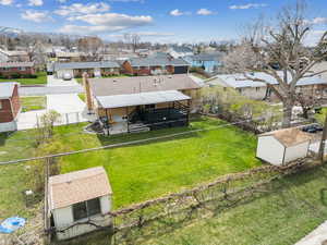Drone / aerial view with a residential view of back of property