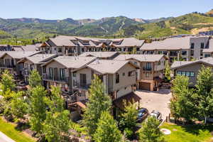 Aerial view of residential area with a mountainous background