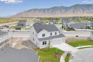 Aerial view of residential area with a mountainous background