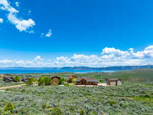 View of mountain backdrop with a nearby body of water