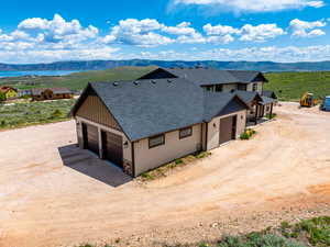 View of subject property with mountains