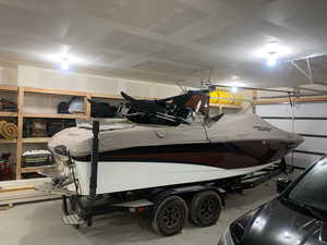 Garage featuring a garage door opener