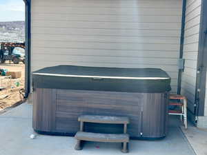 Exterior details with a hot tub