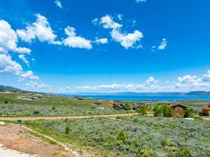 View of mountain background with a nearby body of water