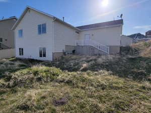 Back of property featuring fence