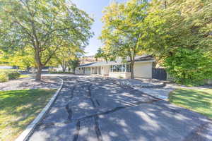 Ranch-style home with brick siding