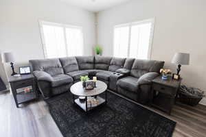 Living room featuring wood finished floors