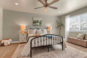 Bedroom featuring baseboards, carpet, ceiling fan, and recessed lighting