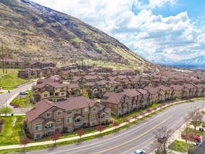 Aerial view featuring a residential view and a mountain view